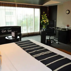 Отель Golden Tulip Mandison Suites 4* Номер Делюкс фото 20