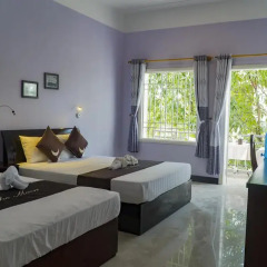 Отель The Moon Villa Hoi An 2* Стандартный семейный номер с различными типами кроватей фото 22