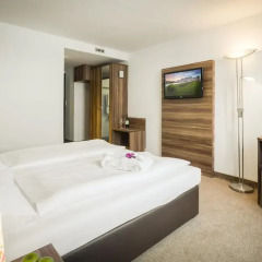 Отель Arthotel ANA Enzian 3* Стандартный номер с различными типами кроватей фото 6