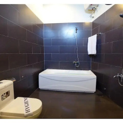 Отель Green Tea Homestay 2* Стандартный семейный номер с различными типами кроватей фото 2