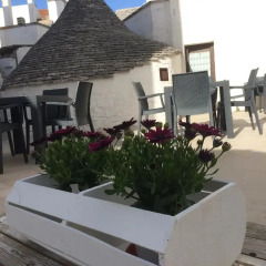 Отель Trulli Family Альберобелло питание