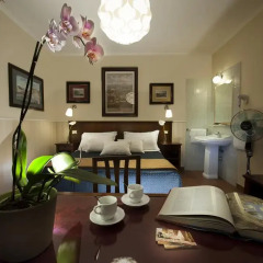 Отель Carlito Budget Rooms Стандартный номер с двуспальной кроватью (общая ванная комната)