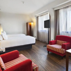 Отель NH Milano Touring 4* Улучшенный номер с различными типами кроватей фото 34
