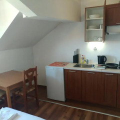 Апартаменты Gondola Apartments & Suites в номере