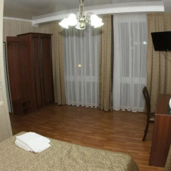 Mini-Hotel Tri Art Стандартный семейный номер с двуспальной кроватью фото 10