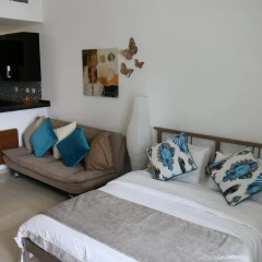 Отель Signature Holiday Homes - Botanica комната для гостей
