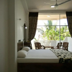 Отель Coconut Bay Шри-Ланка, Калутара - отзывы, цены и фото номеров - забронировать отель Coconut Bay онлайн комната для гостей фото 3