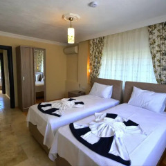 Villa Kelebek Oz Турция, Патара - отзывы, цены и фото номеров - забронировать отель Villa Kelebek Oz онлайн комната для гостей фото 2