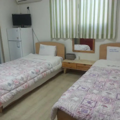 Отель Hongdae Family Housetel 2 Стандартный номер с 2 отдельными кроватями