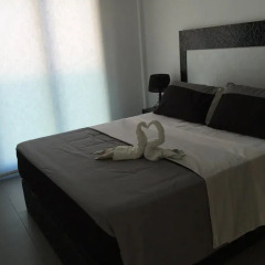 Отель OasisBeach Penthousse la Zénia комната для гостей фото 2