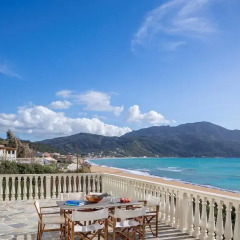 Отель Cosmos Beach House пляж