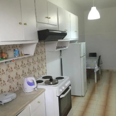 Апартаменты Sunsetia Apartment в номере