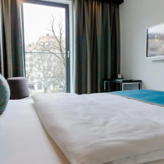 Отель Motel One München Sendlinger Tor Германия, Мюнхен - отзывы, цены и фото номеров - забронировать отель Motel One München Sendlinger Tor онлайн комната для гостей фото 5