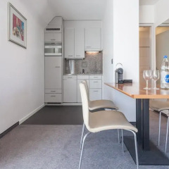 Апартаменты EMA House Serviced Apartments, Seefeld в номере