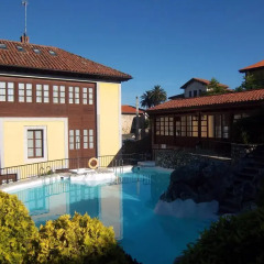 Отель Apartamentos La Casona De Vidiago бассейн