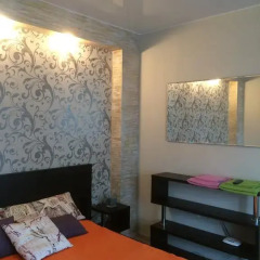 Гостиница Apartamenti na Vladimirskoy 7A в Пскове отзывы, цены и фото номеров - забронировать гостиницу Apartamenti na Vladimirskoy 7A онлайн Псков комната для гостей фото 5