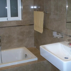 Апартаменты Garden View Apartment Меллиха ванная