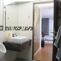 Апартаменты BBG Seaside Luxurious Service Apartment ванная