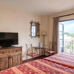 Отель PortAventura Hotel El Paso - Theme Park Tickets Included Испания, Салоу - 12 отзывов об отеле, цены и фото номеров - забронировать отель PortAventura Hotel El Paso - Theme Park Tickets Included онлайн комната для гостей фото 2