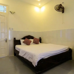 Отель Nhu Huy Homestay Стандартный номер с различными типами кроватей фото 2