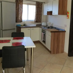 Отель Mellieha Centre Penthouse Меллиха в номере фото 2