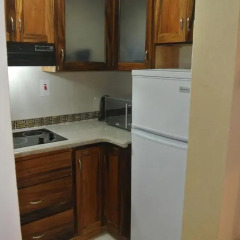 Отель Beach One Bedroom Suite 13 в номере фото 2