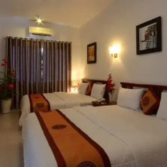 Hanh Dat Hotel Hue 3* Семейный номер Делюкс с двуспальной кроватью фото 2