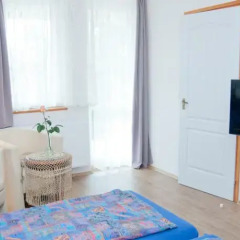 Апартаменты Deluxe Apartments комната для гостей фото 2