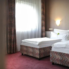 Отель Airport Hotel by The New Yorker Германия, Кёльн - 1 отзыв об отеле, цены и фото номеров - забронировать отель Airport Hotel by The New Yorker онлайн комната для гостей фото 5