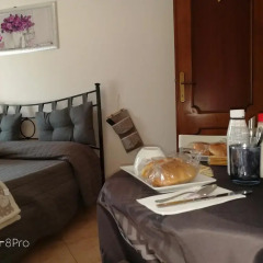 Отель La Perla B&B в номере