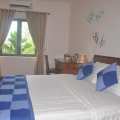 Отель Tra Que Riverside Homestay 2* Улучшенный номер с различными типами кроватей фото 9