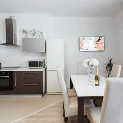 Апартаменты At Home Apartment в номере