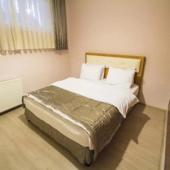 Апартаменты Feyza Apartments Семейные апартаменты с двуспальной кроватью фото 24