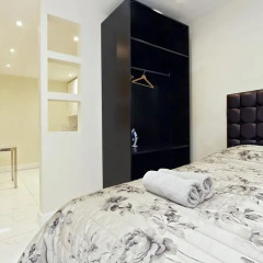 Отель Hyde Park Serviced Rooms сейф в номере