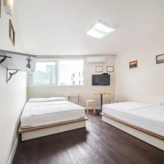 Хостел Itaewon Inn Стандартный номер с 2 отдельными кроватями фото 6