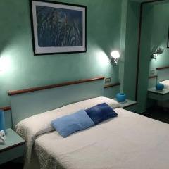 Le Petit Hotel комната для гостей