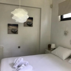 Апартаменты Chris Apartments комната для гостей