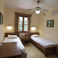 Отель Mango Rooms Родос комната для гостей