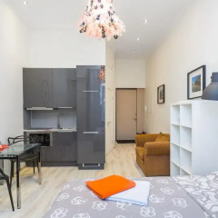 Апартаменты Four Squares Apartments on Tverskaya комната для гостей фото 3