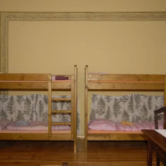 Hostel Mleczarnia Кровать в общем номере с двухъярусной кроватью фото 3
