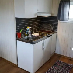 Отель Tjeldsundbrua Camping Коттедж с различными типами кроватей фото 37