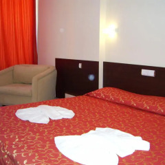 TM Deluxe Hotel удобства в номере