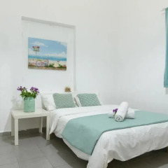 Апартаменты Hacarmel Apartment Тель-Авив комната для гостей фото 5