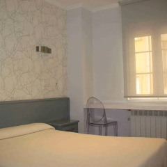 Отель Hostal Valadares Стандартный номер с различными типами кроватей фото 7