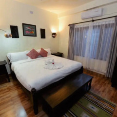 Отель Mingtang Garden Cottage 名堂花园度假屋 Непал, Покхара - отзывы, цены и фото номеров - забронировать отель Mingtang Garden Cottage 名堂花园度假屋 онлайн комната для гостей фото 2