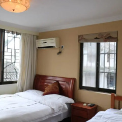 Отель Zhou Zhuang Zhen Feng Inn сейф в номере