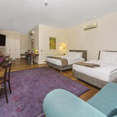 Отель Misafir Suites 8 Istanbul 4* Люкс с различными типами кроватей фото 13