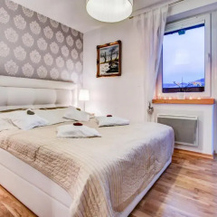 Отель Apartamenty Krzeptowskiego Закопане комната для гостей фото 3