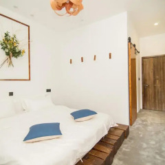 Отель Zaimushe Holiday Courtyard 2* Номер Делюкс с различными типами кроватей фото 4