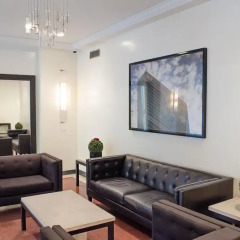Отель Global Luxury Suites at Olympia House интерьер отеля